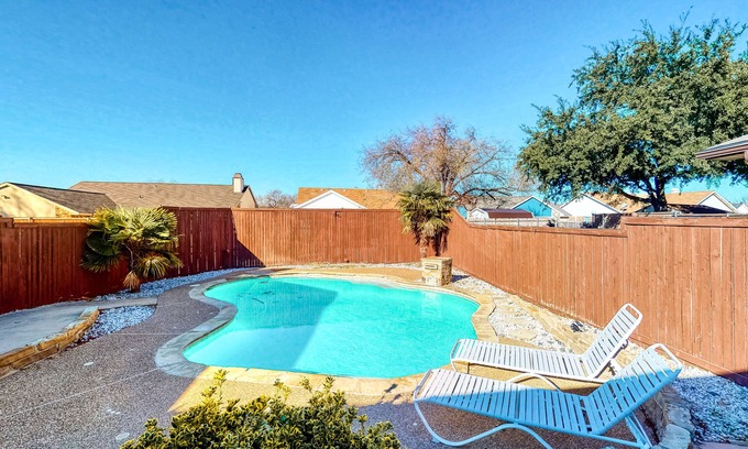 The Colony Casa | Dog-friendly remodeled home with full kitchen, outdoor pool, & arcade games