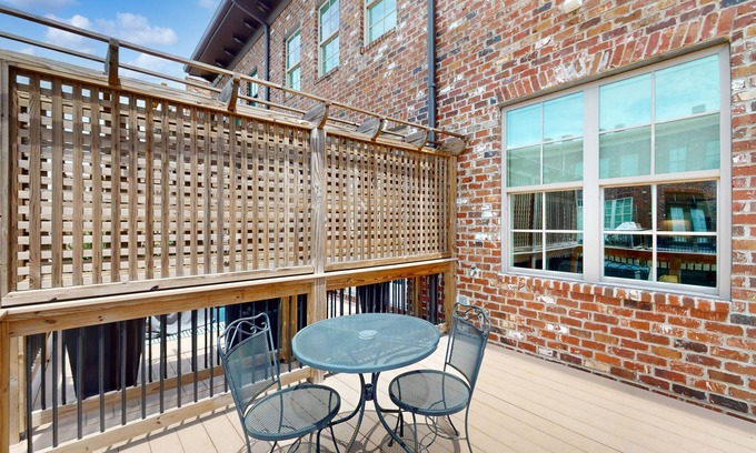 Hitch Village - Fred Wessels Homes Casa | Dog-friendly townhouse with modern kitchen, balcony, garden tub, & central AC