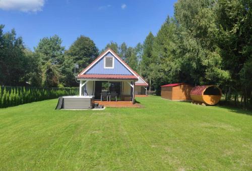 Pisz Casa | Domek z jacuzzi,kajaki i rowery,sauna -Malinowy Reset