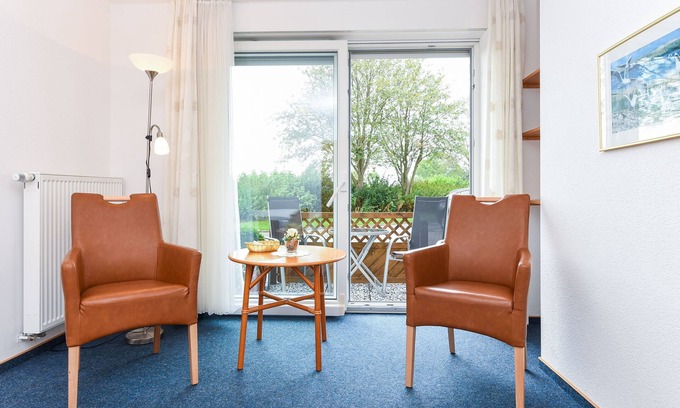 Neuharlingersiel Cabaña | Double room with balcony or terrace - Double room in the Hotel-Pension