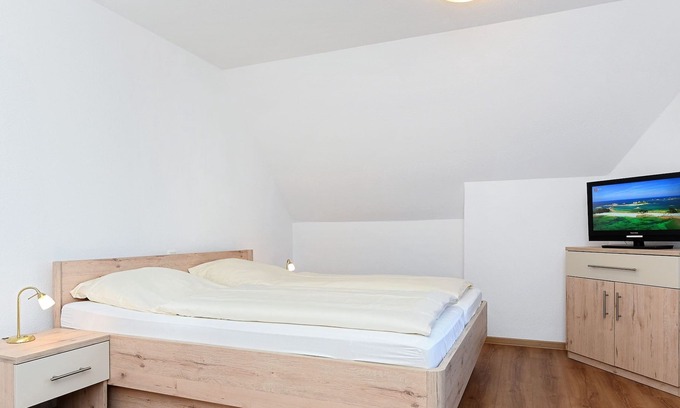 Neuharlingersiel Cabaña | Double room with balcony or terrace - double room in the Hotel-Pension Marlies