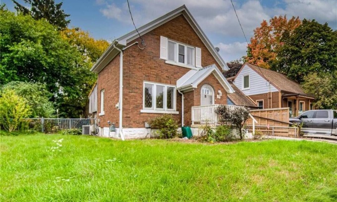 Kitchener Casa | Downtown House: Patio - Fire Pit - Lawn Chairs