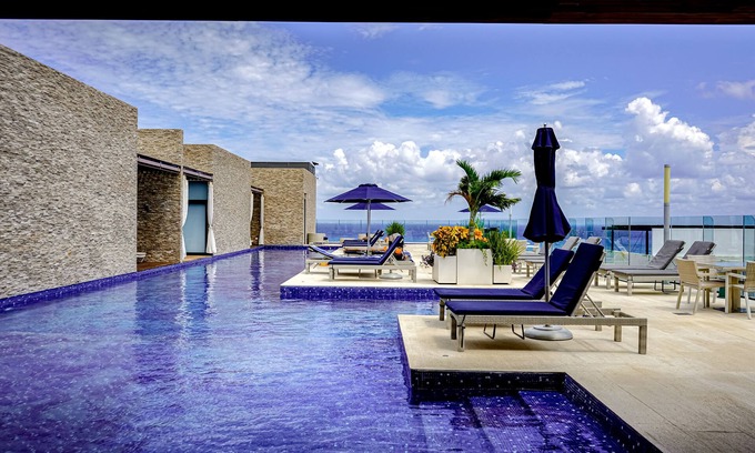 Gonzalo Guerrero Apartamento | Dream getaway near the beach and city with pool, balcony, gym, fast WiFi & W/D