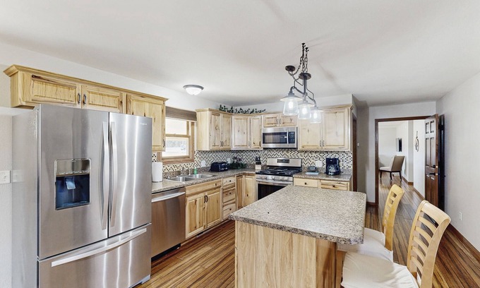 Rapid City Casa | Dual unit home with fenced yard, grill, firepit & jetted tub - close to town