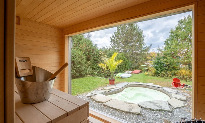 Eastman Cabaña | Eastern Townships waterfront with salt-in-ground spa, sauna, pool table and wifi