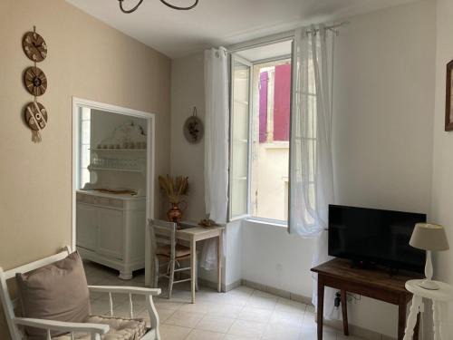 Aubeterre-sur-Dronne Apartamento | Echoppe Ancienne Boutique de cordonnier avec jardin privé