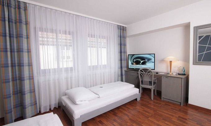 Erlangen Cabaña | Einzelzimmer Komfort - Art Hotel Erlangen