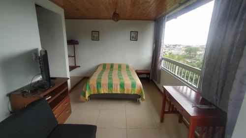 Calarca Apartamento | El Amor Nos Une, 1habitacion, acogedor, vista a zonas verdes