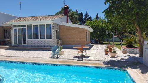 Chiclana de la Frontera Chalet De Esquí | El Cortijo