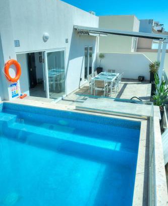 Tal-Ibrag Apartamento | Elegant 2 bedrooms, large sun terrace, pool GCAT1-1