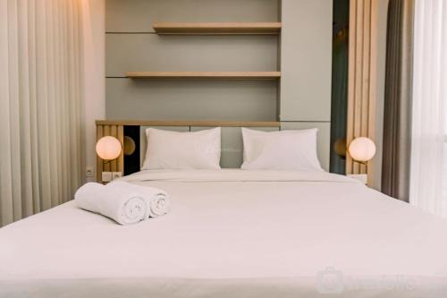 Pinang Apartamento | Elegant and Comfort 1BR at The Smith Alam Sutera Apartment By Travelio