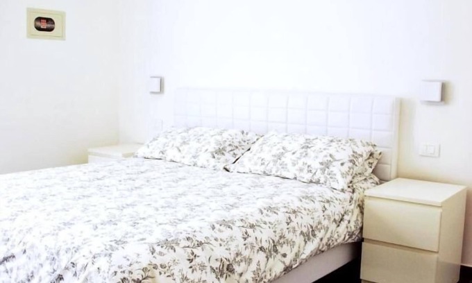 Marina Centro Apartamento | Elegante y confortable apartamento en la planta baja a 300 metros del mar en Rímini con plaza de aparcamiento privada