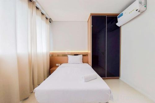 Pinang Apartamento | Elegant and Spacious 2BR at Paddington Heights Apartment By Travelio