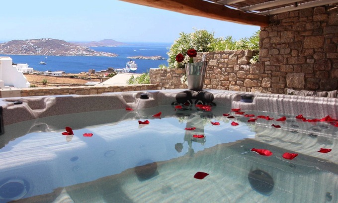 Tourlos Villa | Elegant Mykonos Villa | Villa Rowena | 4 Bedrooms | Breathtaking Sea Views | Spacious Furnished Sun Terrace | Private Outdoor Hot Tub | BBQ Facilities | Shaded Outdoor Dining Area | Agia Sofia, Tourlos