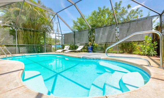 Palm Bay Casa | Elegant Space Coast Private Pool Home w/Garden, Fire Pit, and Billiard Room