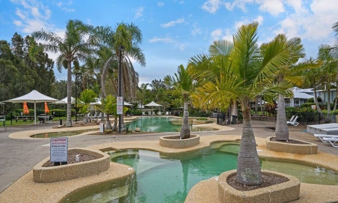 Cams Wharf Villa | Elysian Escape - 4 Pools, Lakeside, Resort Amenities