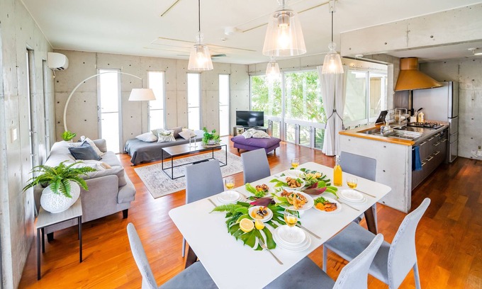 Kadena-cho Casa | EM tree house surrounding a healing tree