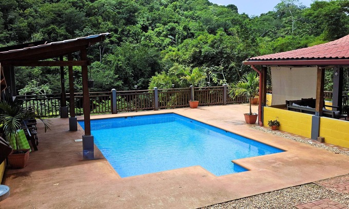 San Ignacio Casa | Enchanting Riverside Jungle Village Bungalow: Pool, A/C, WiFi, TV, Kayaks & More