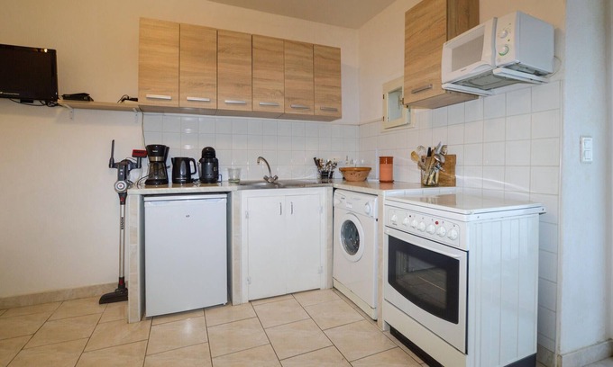 Petreto-Bicchisano Apartamento | Enjoy a wonderful break close to nature in this inviting vacation apartment.