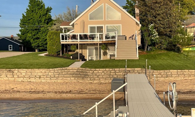 Beulah Casa | Enjoy Crystal Lake's pristine water and amazing sunsets from this lakefront home