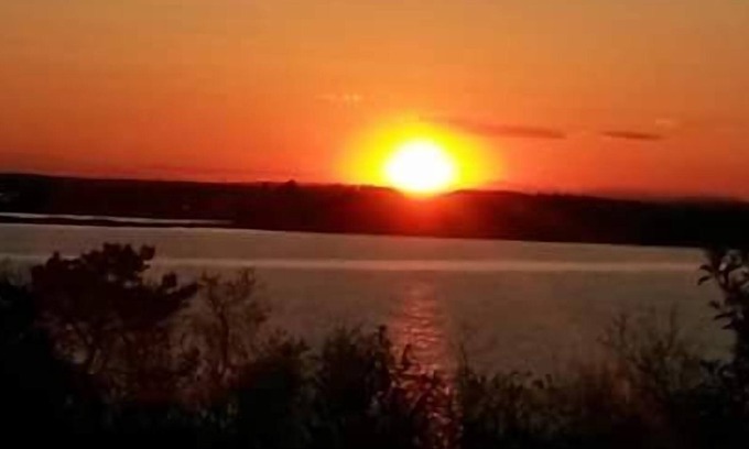 Mid-Coast and Islands Casa | Enjoy picturesque inlet views of a working harbor and sunny days at your oceanfront cottage