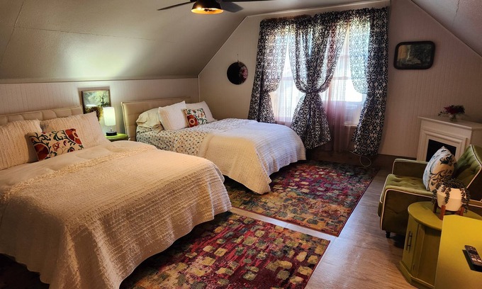 Lansing Casa | Enjoy the top floor of this victorian house With two suites & a bonus bedroom