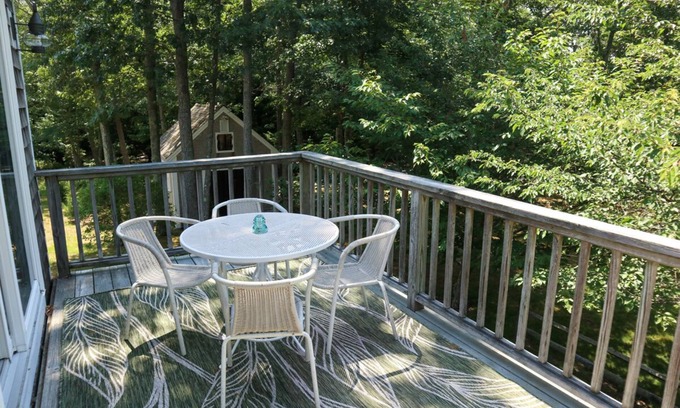 Brewster Casa | Enjoy this 1,600 sqft two story guest house with A/C, garage, balcony, and access to bike trail!