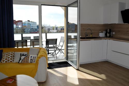 Courseulles-sur-Mer Apartamento | Entre Plage et Ports, Le 49 - avec balcon 4 étoiles