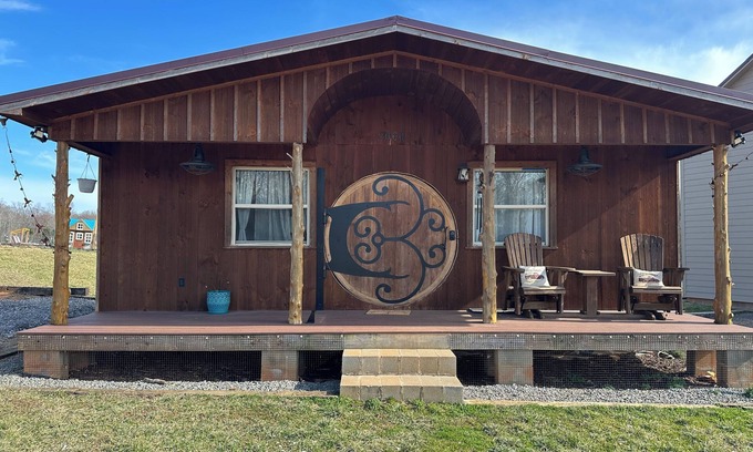 Hamptonville Cabaña | Escape to a Hobbit cottage overlooking a pond with water wheel in wine country!