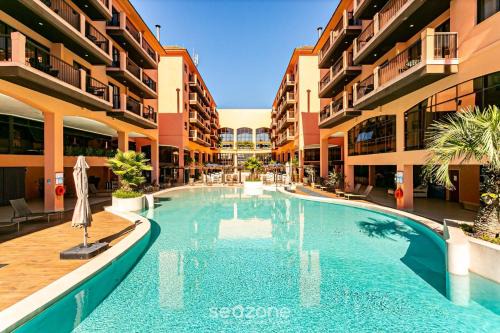 Jurere Complejo | Estúdios Modernos em Resort pé na areia - Jurerê Beach Village JBVJR