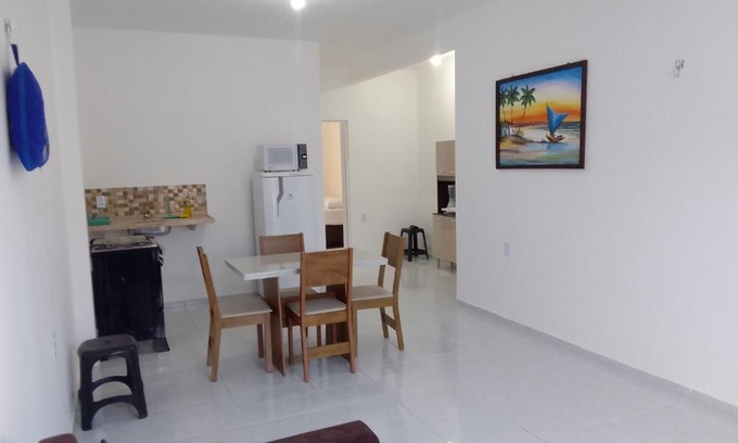 Prea Apartamento | Estrela Apartamento 2 terreo - Quarto e sala com cozinha americana na praia do prea-Ce