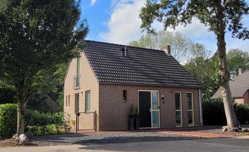 Ewijk Casa | Evergreen wellness met sauna & hottub