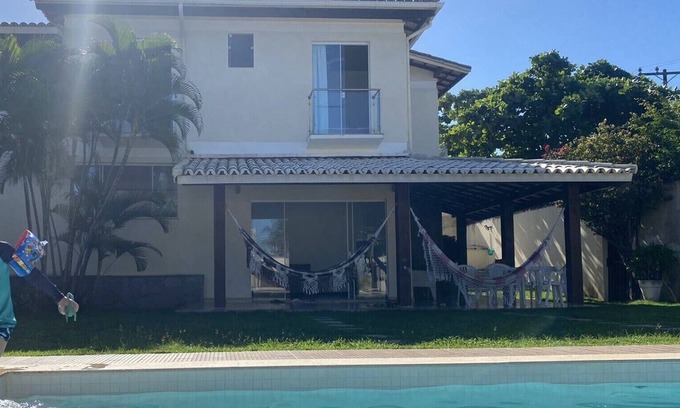 Vilas do Atlantico Casa | Excelente casa de playa con piscina, amplio y agradable jardín, cerca de la playa.