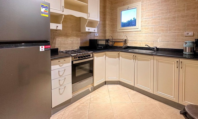 Village Road Apartamento | Exclusive apartment with private garden area and big swimming pool