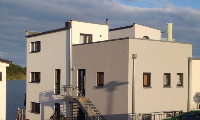 Kahnsdorf Condominio | Exclusive vacation apartment directly above the water