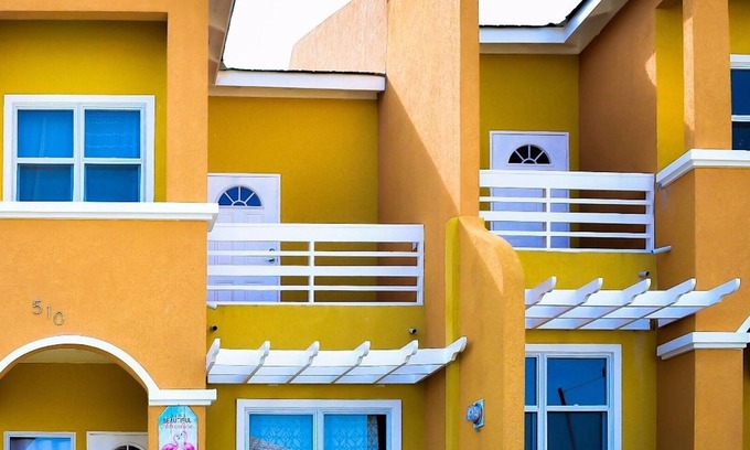 Runaway Bay Casa | EXOTIC BAYOU "Una experiencia de hogar lejos del hogar"