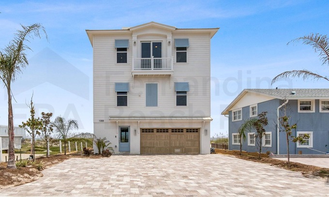 Ocean Cay Casa | Experience oceanfront luxury at 1088 S. Fletcher Ave, a spacious 5-bedroom house