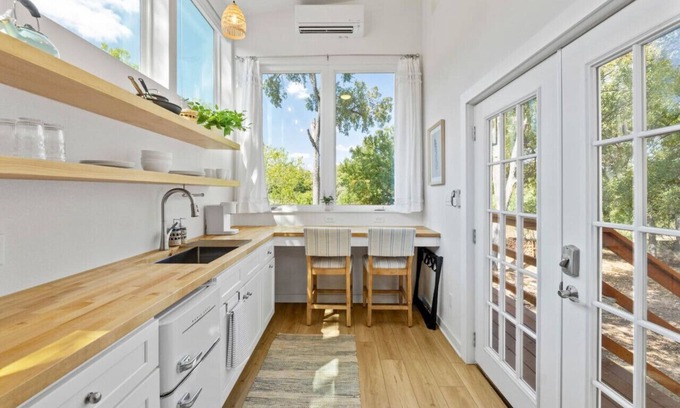 East MLK Casa | Extended Stay Haven: A+ Deck w/ Greenbelt Views!