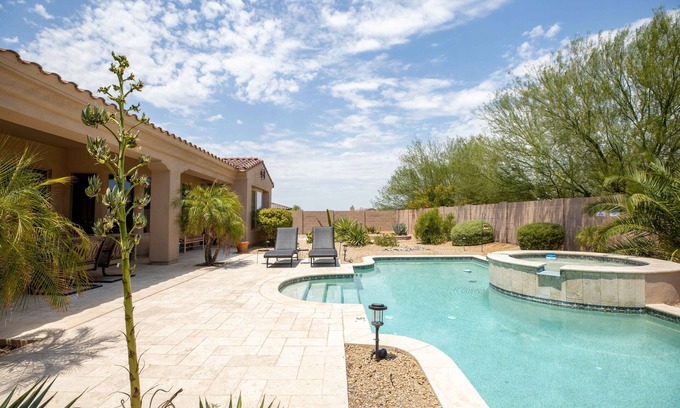 Estrella Mountain Ranch Casa | Fabulous custom home with a pool on a Jack Nicholas golf course