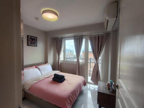 Paranaque Apartamento | Facing Pool w Balcony MOA BP1741