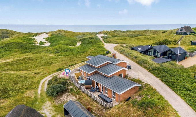 Sondervig Casa | Family-friendly holiday home with indoor pool and outdoor spa 100 meters from the North Sea.