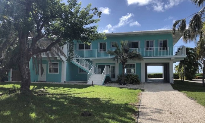 Cudjoe Key Casa | Frente al mar con muelle, piscina y jacuzzi