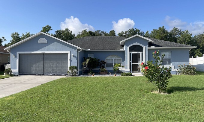 Crescent Lakes Casa | Family Retreat: Poolside Haven in Kissimmee