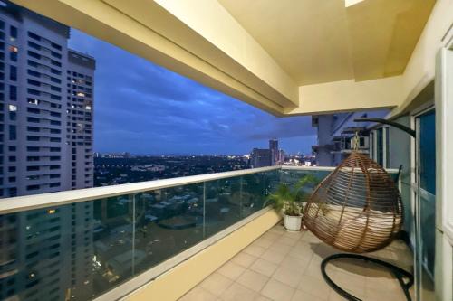 Legazpi Village Apartamento | Family size Staycation in Makati with new year's firework balcony view