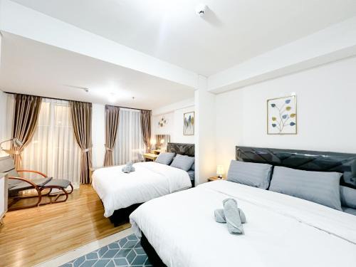 Arjuna Apartamento | Family Suite at Landmark Residence