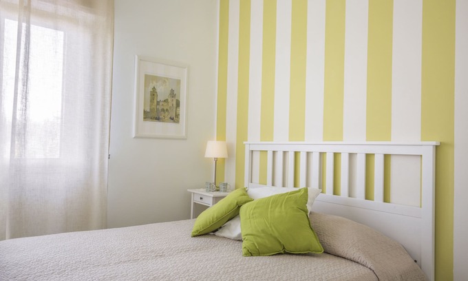 Cefalu Apartamento | Familyholidays Magnolia. Apartamentos en villa con jardín cerca del mar.