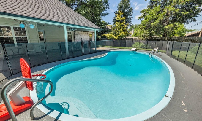 Tulsa Casa | Fenced in Pool-Jacuzzi Tub-Walk to Dining & Shopping-Garage Parking-Gym