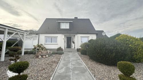 Ratekau Casa | Ferienhaus Achterhus für Familien & Homeoffice