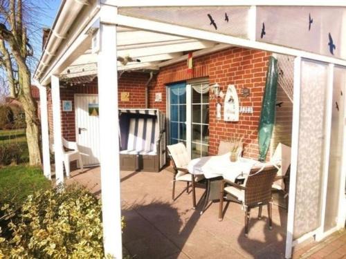 Neßmersiel Casa | Ferienhaus Huus Wattenmeer in Nessmersiel mit Garten, Terrasse, Sauna, Räder, und Grill