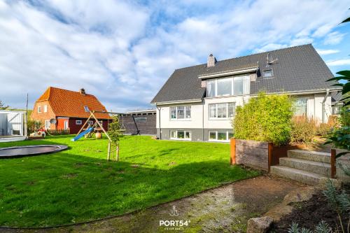 Dagebuell Casa | Ferienhaus Pegelbude Dagebüll